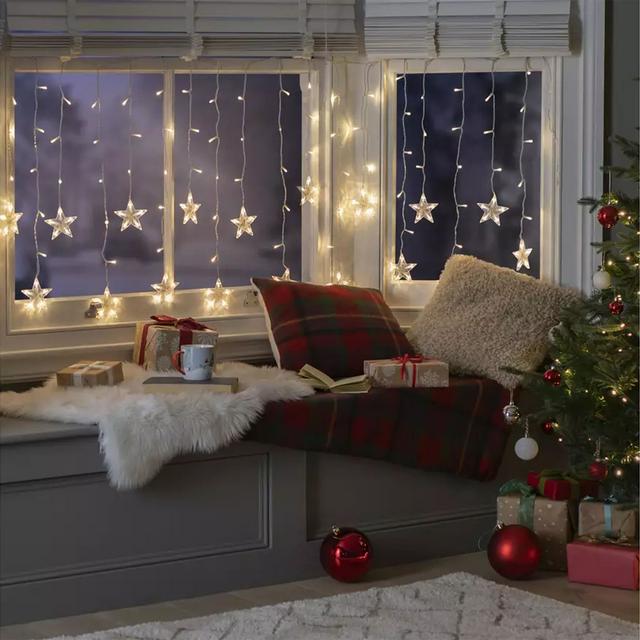 Sainsbury's Home Warm White Star Shaped Christmas Curtain Lights - gallery image 1